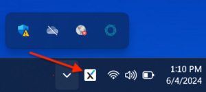 This image shows a black and blue X icon on the taskbar